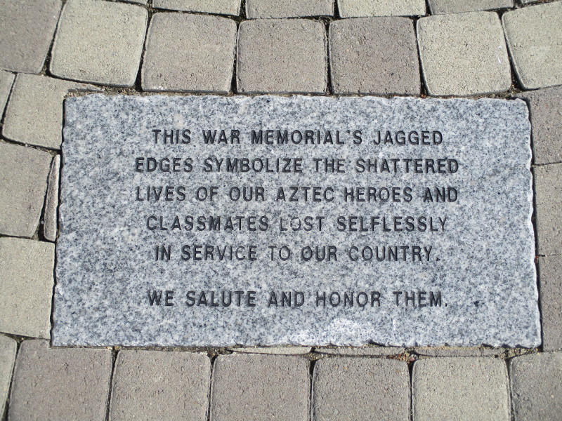 A Plaque at the base of SDSU's War Memorial.