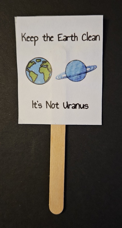 Keep the Earth Clean. It's Not Uranus. Mini Protest Sign with an image of the Earth and Uranus.