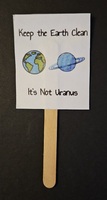 Keep the Earth Clean. It's Not Uranus. Mini Protest Sign with an image of the Earth and Uranus.