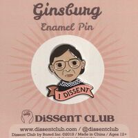 A enamel lapel pin of Ruth Bader Ginsberg that says "I dissent"